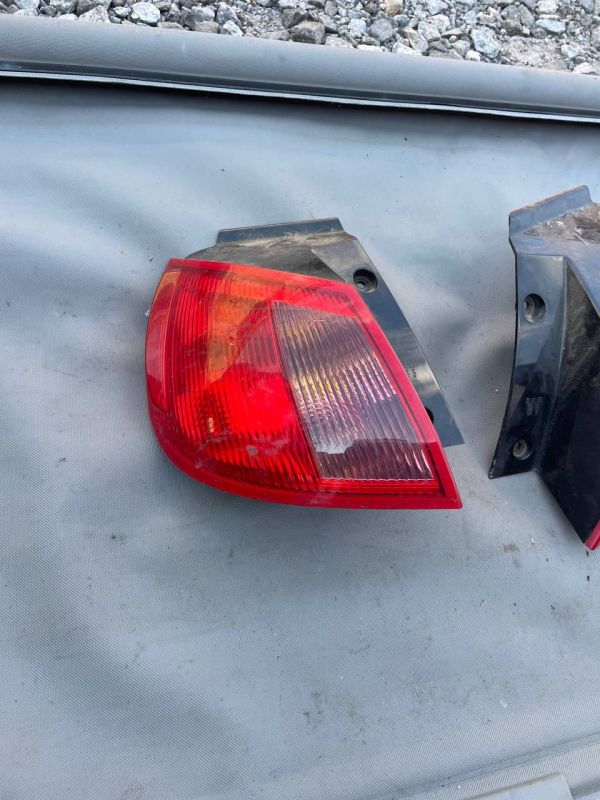 Ліхтарі стопи задній лівий Mitsubishi Colt (04-12) фонарь кольт