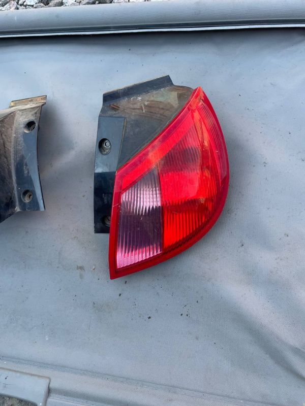 Ліхтарі стопи задні правий лівий Mitsubishi Colt (04-12) фонарь кольт