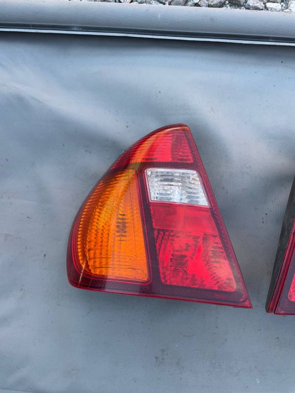 Задній ліхтар лівий стопи Renault Symbol, (Рено Симбол) фонарь Clio