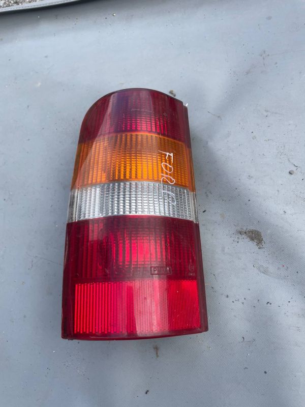 Задній лівий стоп ліхтар фонарь Ford Courier 1996-1999г.в