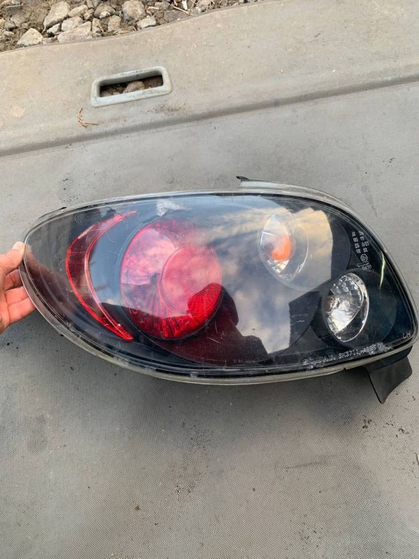 Стоп задній лівий Ліхтар фонарь Peugeot 206 Китай