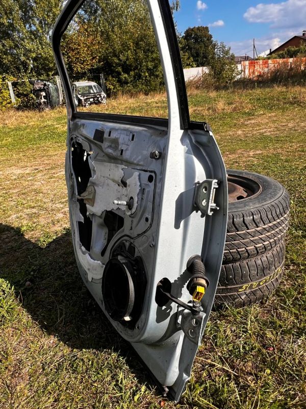 Дверка задня ліва Citroen C4 2004-2010